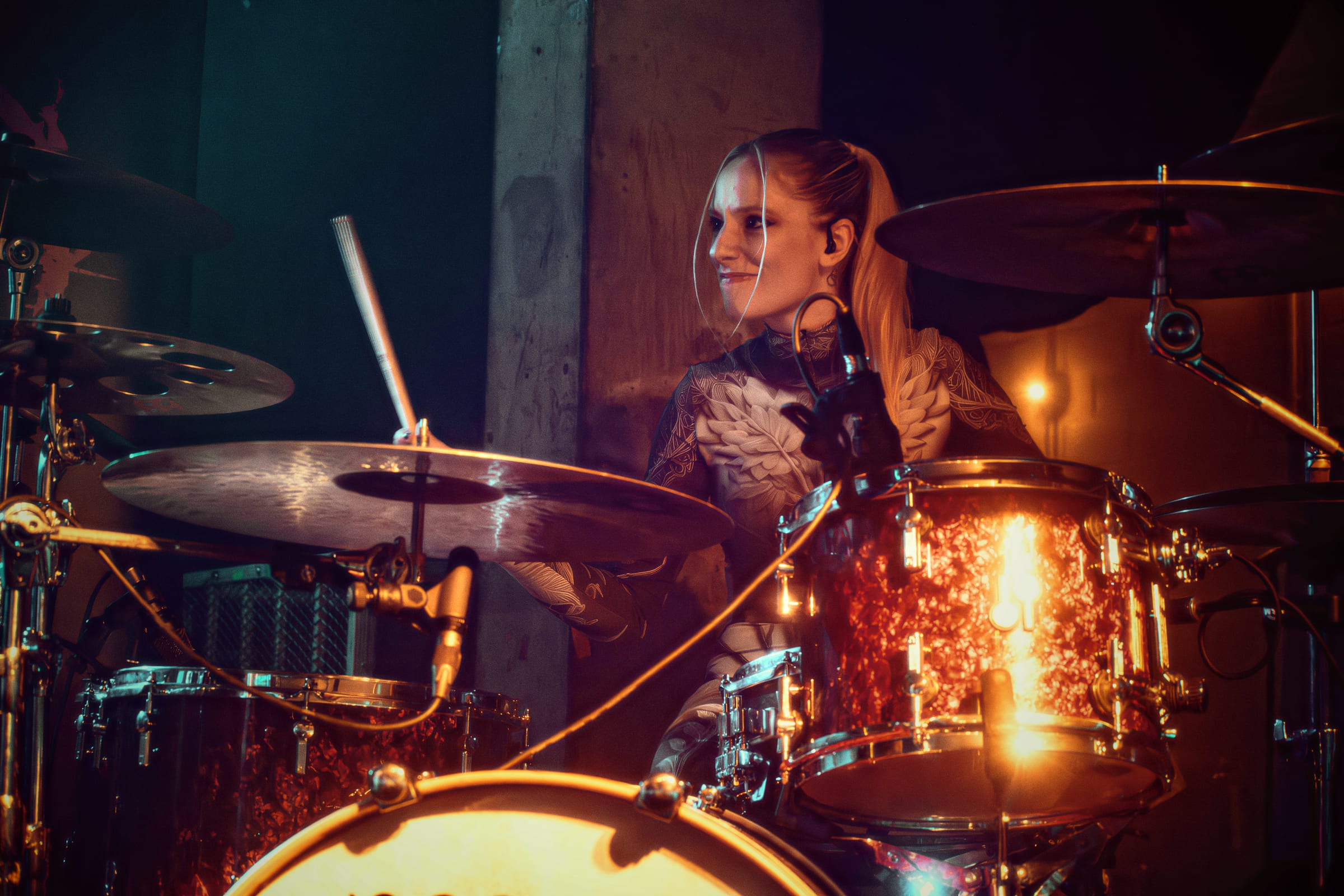 Anna Mylee with drumsticks